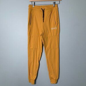 The Barbell Cartel harvest gold women's reflex joggers